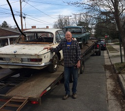 BMW 2000cs and 2000c loaded on trailer