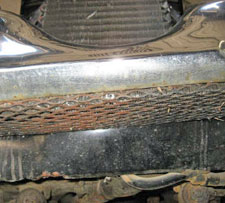 secondary air conditioner condenser installation for a 1960s Jaguar