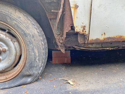 1968 BMW 2000cs showing severe rust damage at the A-pillar